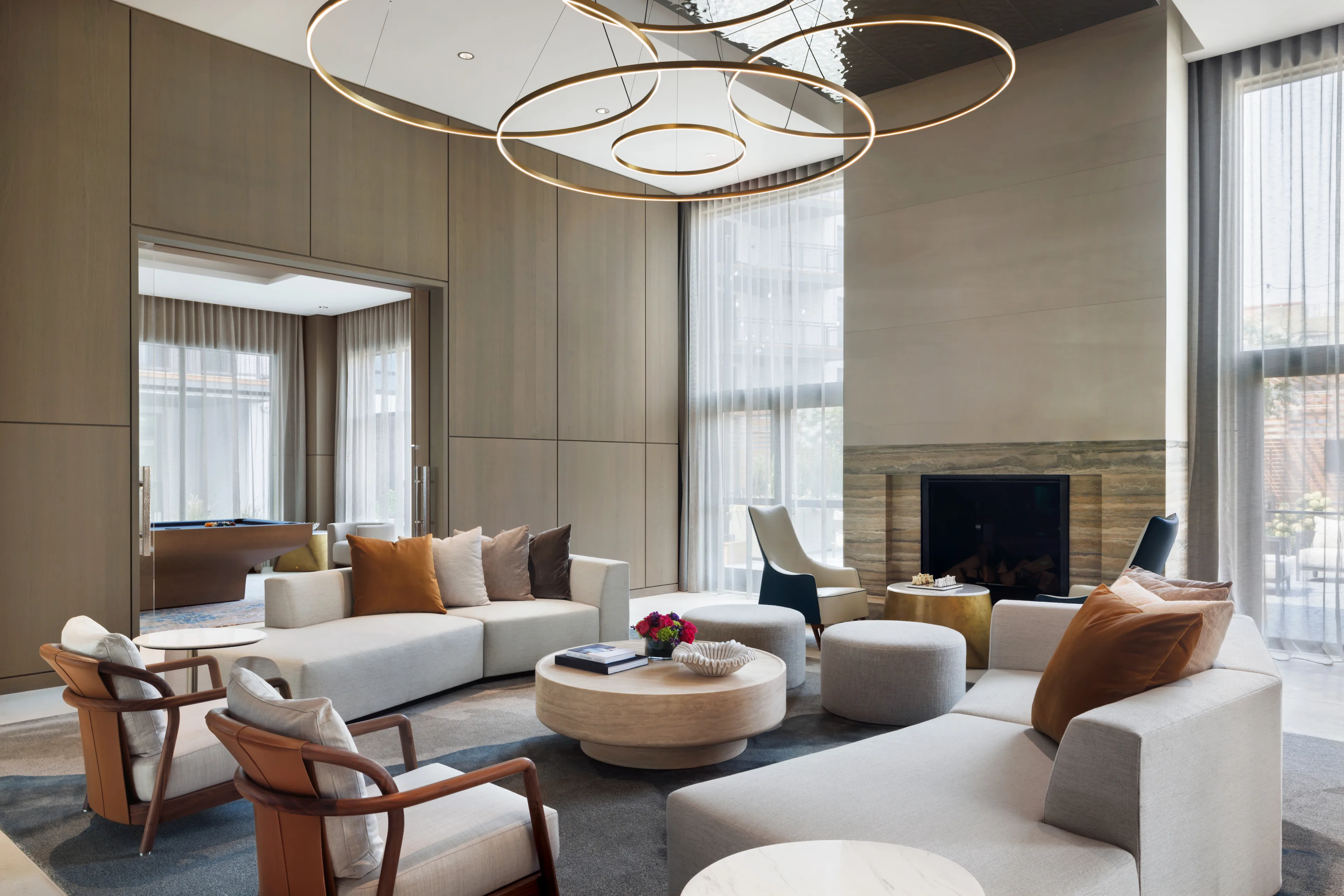 Luxury lounge with fireplace and modern seating