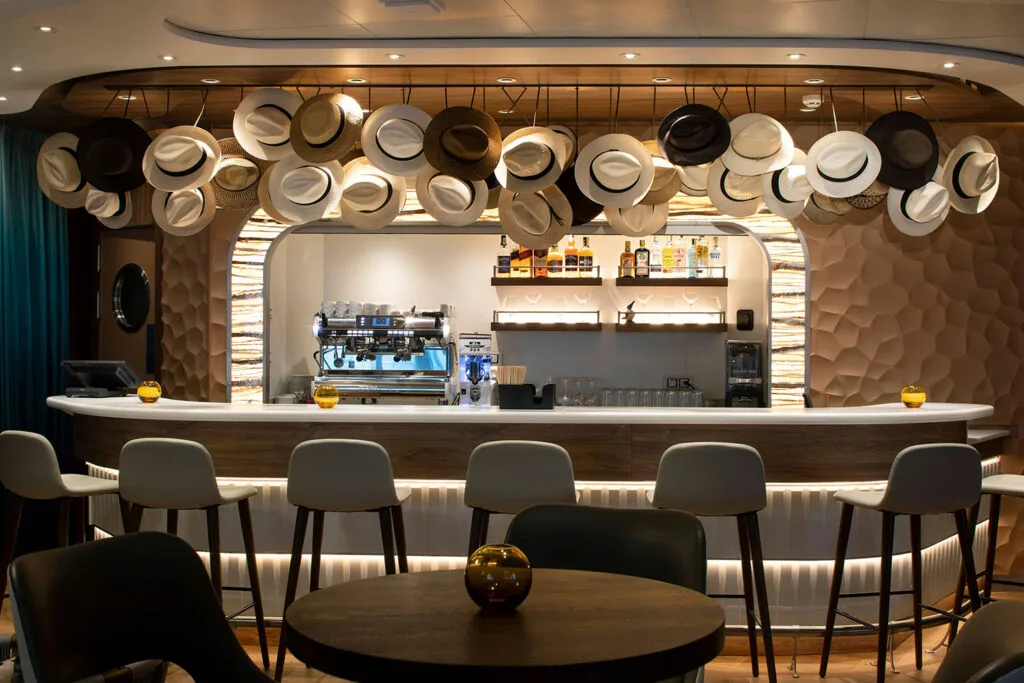 Flora bar with illuminated counter and hat display.