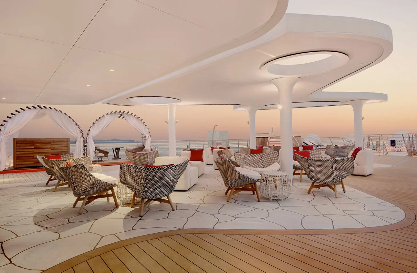 Open-air deck lounge at sunset.